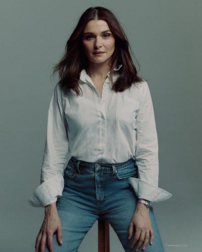 Rachel Weisz in contemporary white shirt and classic blue jeans.