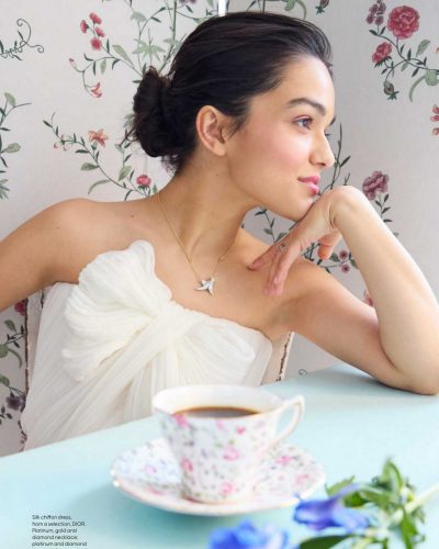 Rachel Zegler airy red dress with playful spring vibe