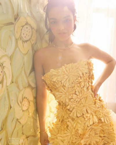 Rachel Zegler modern red gown with ruffled details