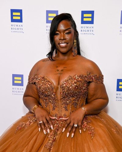 Raeshanda Lias amber gown with ornate embroidery