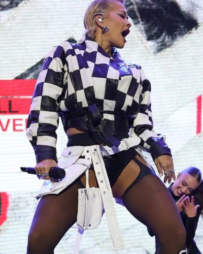 Rita Ora black bodysuit and edgy checkered jacket