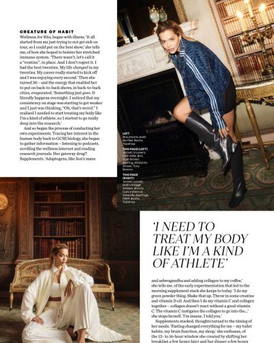 Rita Ora in black swimsuit complemented by matching accessories