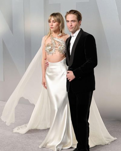 Robert Pattinson in stylish black tuxedo with crisp white shirt