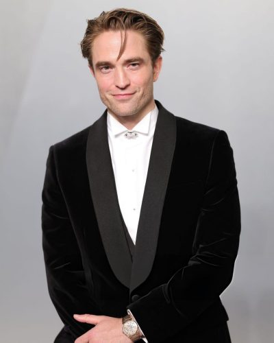 Robert Pattinson with tailored fit black tuxedo and satin details