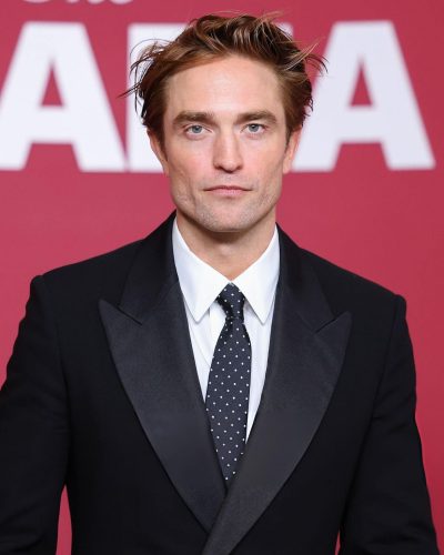 Robert Pattinson in tailored black suit and crisp white shirt