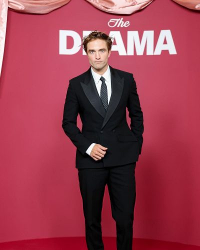 Robert Pattinson in fitted black suit with elegant details