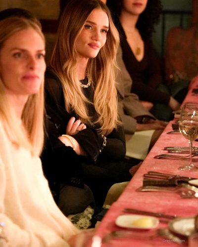 Rosie Huntington-Whiteley plush black fur coat with semi-sheer gloves.