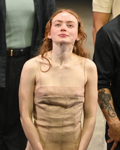 Sadie Sink in a nude gown that captures the light