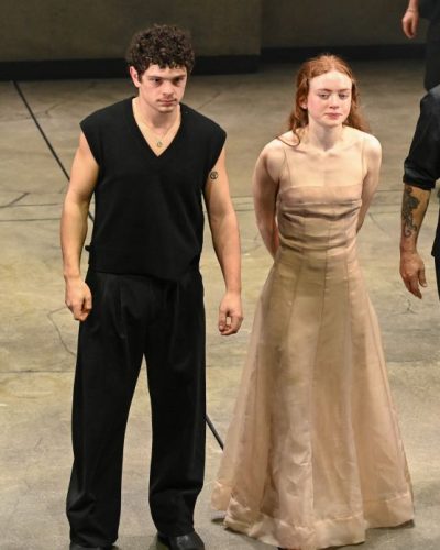 Sadie Sink in a soft nude gown with gentle draping