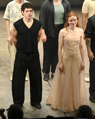 Sadie Sink in a flowing nude gown with graceful silhouette