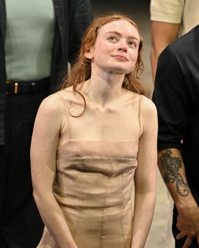 Sadie Sink in a classic nude dress with understated charm
