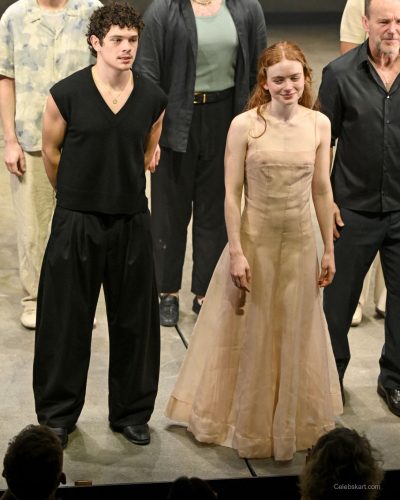 Sadie Sink wearing a simple nude dress with light fabric