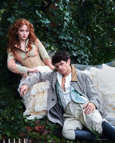 Sadie Sink in a black gown featuring delicate lace detailing.