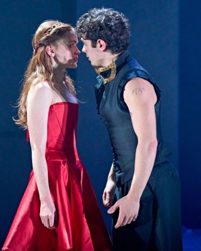 Sadie Sink wearing a light corset and elegant lace shorts