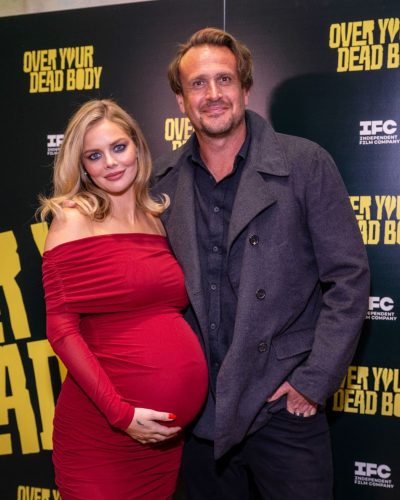 Samara Weaving vibrant red gown with gathered detailing