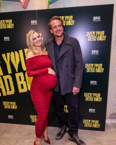 Samara Weaving fitted red dress with playful details