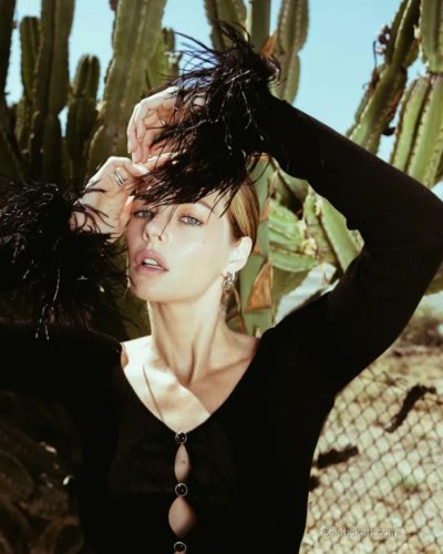 Samara Weaving in bridal gown with intricate details and soft gloves