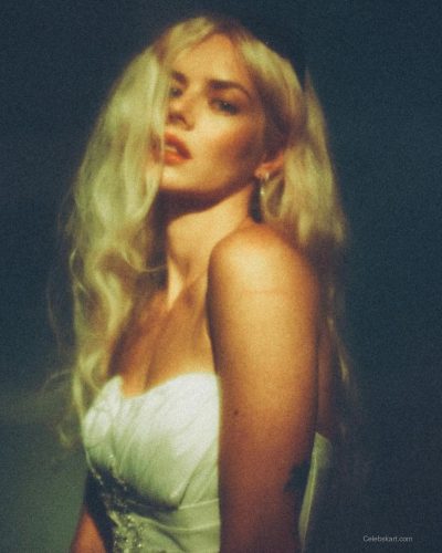 Samara Weaving wearing white dress at appearance 2026