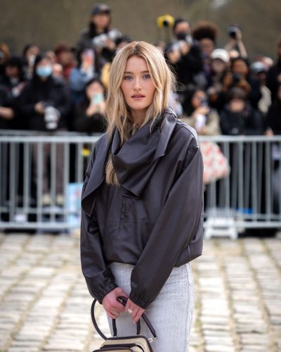 Sarah Pidgeon black leather jacket and minimalist white trousers