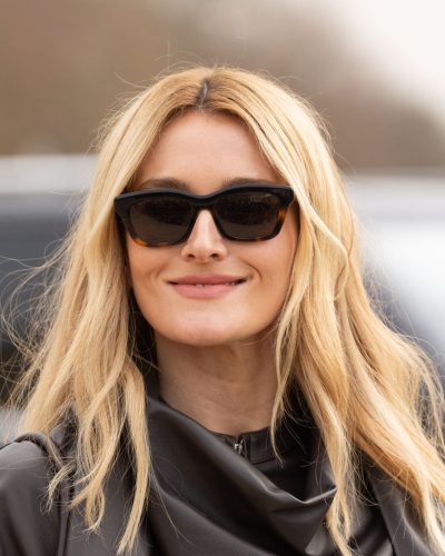 Sarah Pidgeon black leather jacket with flowing white pants