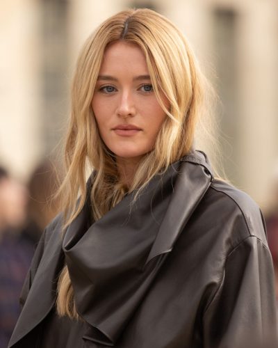 Sarah Pidgeon black leather jacket and textured white pants