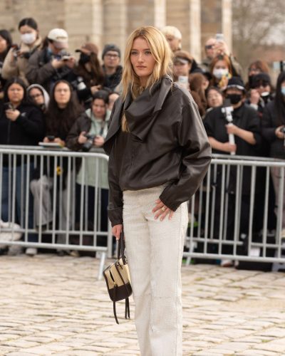 Sarah Pidgeon chic black leather jacket and white trousers