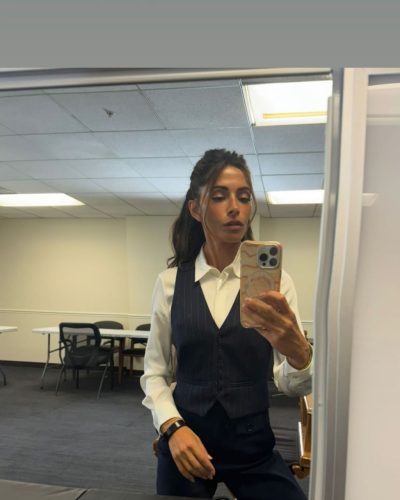 Sarah Shahi in casual gray tank top and comfy shorts