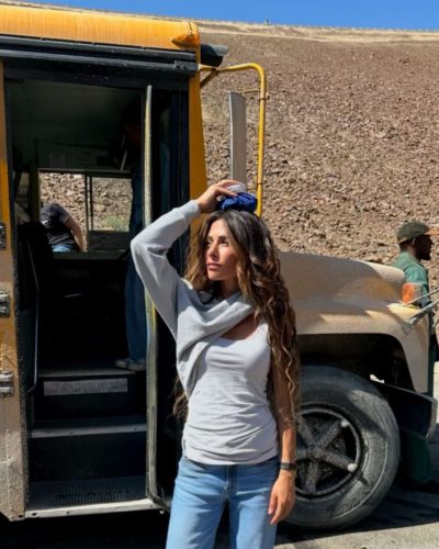 Sarah Shahi in soft floral-patterned robe with pastel tones