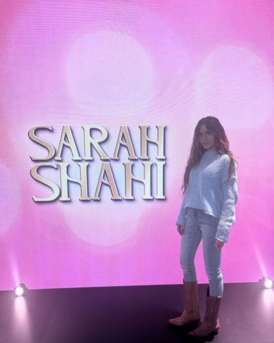 Sarah Shahi trendy deep blue velvet jacket with denim