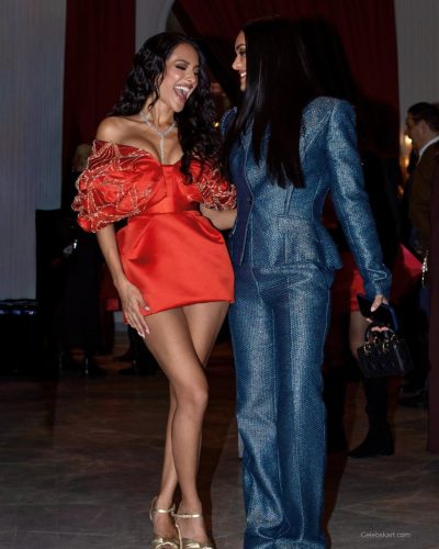 Seerat Saini in a bold red gown with exquisite detailing.