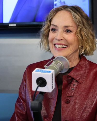 Sharon Stone wearing contemporary khaki pants with bold design.