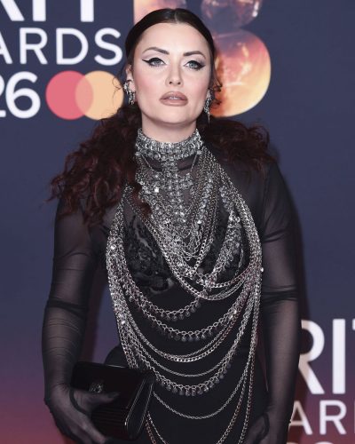Shona McGarty in fitted black gown adorned with chains