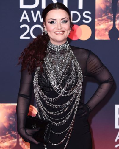 Shona McGarty with elegant black gloves and black gown