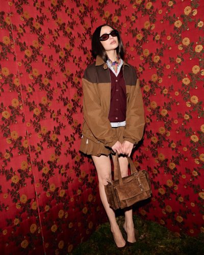 Sofia Carson turns heads in brown jacket