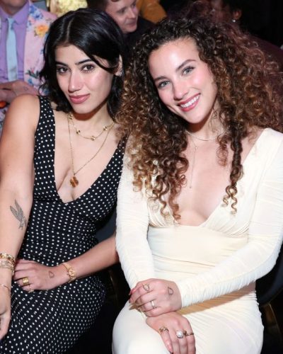 Sofie Dossi cheerful yellow dress with a sophisticated silhouette.