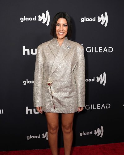 Stephanie Beatriz silver strappy heels complementing her attire