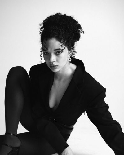 Tanzyn Crawford in vibrant dress a patchwork design