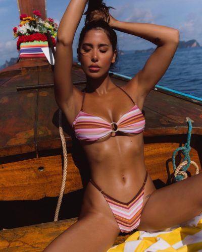 Tatiana Pankal in outfit details in this photoshoot at event