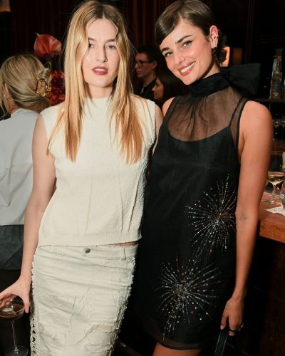 Taylor Hill black gown with fitted silhouette and elegant details