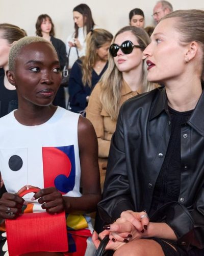 Toni Garrn in black leather coat with stylish black underneath.