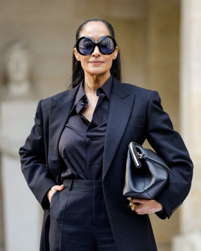 Tracee Ellis Ross in white shoes contrasting black ensemble