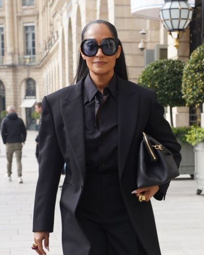 Tracee Ellis Ross in structured black blazer over dark shirt