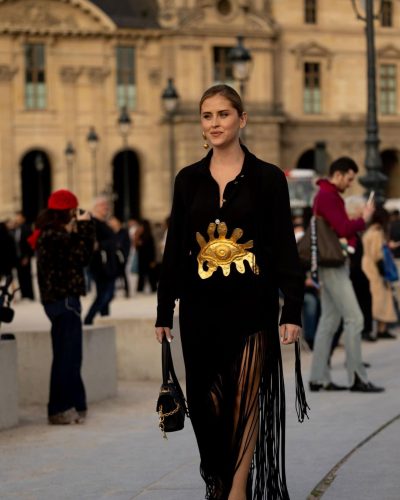 Valentina Ferragni stylish black dress with eye-catching gold accents