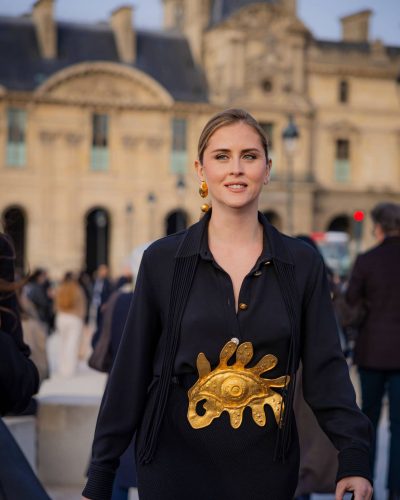 Valentina Ferragni black gown featuring artistic gold waist decoration