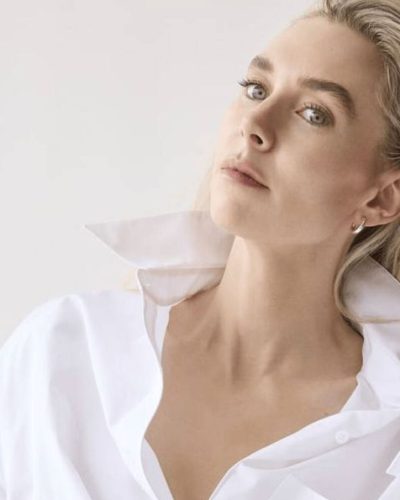 Vanessa Kirby styled in a white shirt and casual denim.