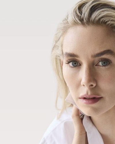 Vanessa Kirby featuring a white shirt with exaggerated collar.