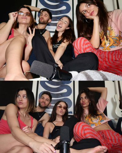 Victoria Justice with a purple wrap and casual graphic top.