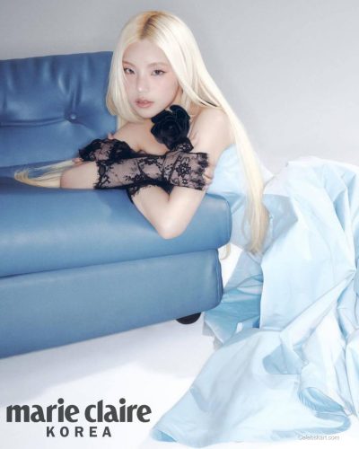 Yeji wearing sophisticated black gown with eye-catching neckline