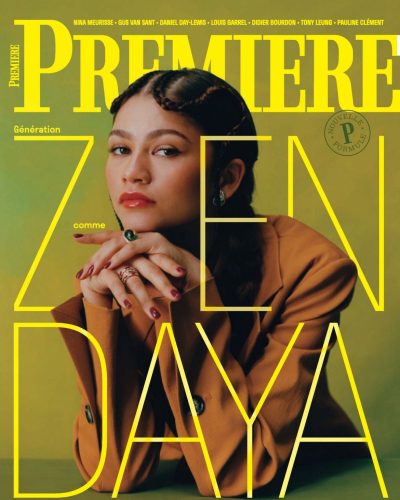 Zendaya in vibrant structured blazer featuring warm earthy tones