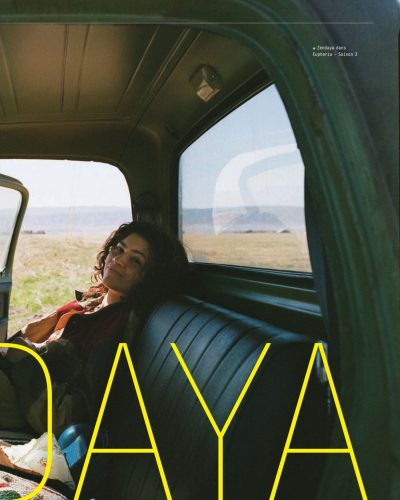 Zendaya wearing earthy-toned blazer with striking green ring